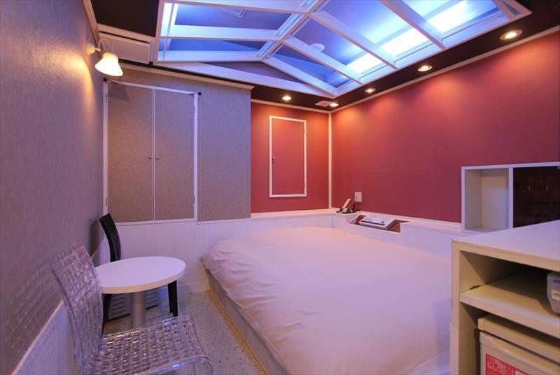 Postel nebo postele na pokoji v ubytování HOTEL DCUBE
