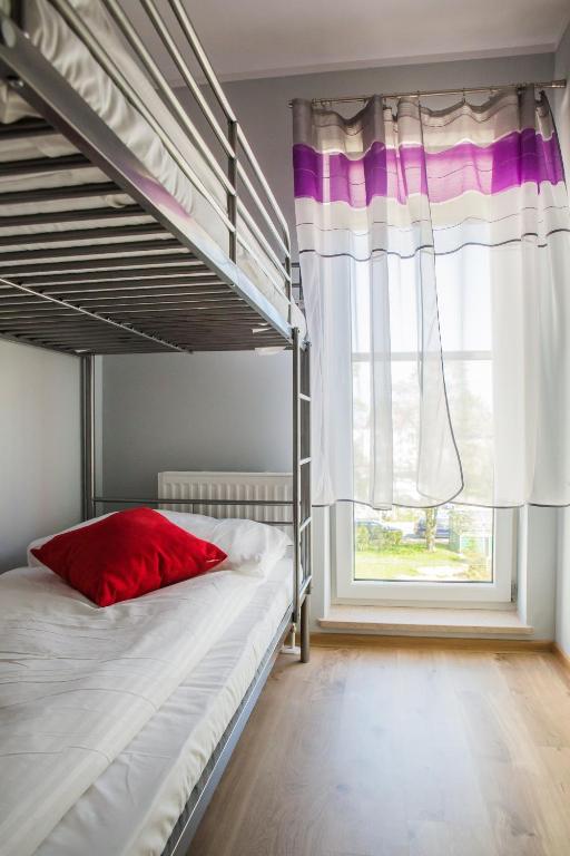 Posteľ alebo postele v izbe v ubytovaní Family Homes - Apartamenty Sonoma