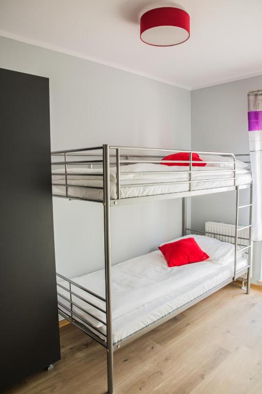 Posteľ alebo postele v izbe v ubytovaní Family Homes - Apartamenty Sonoma