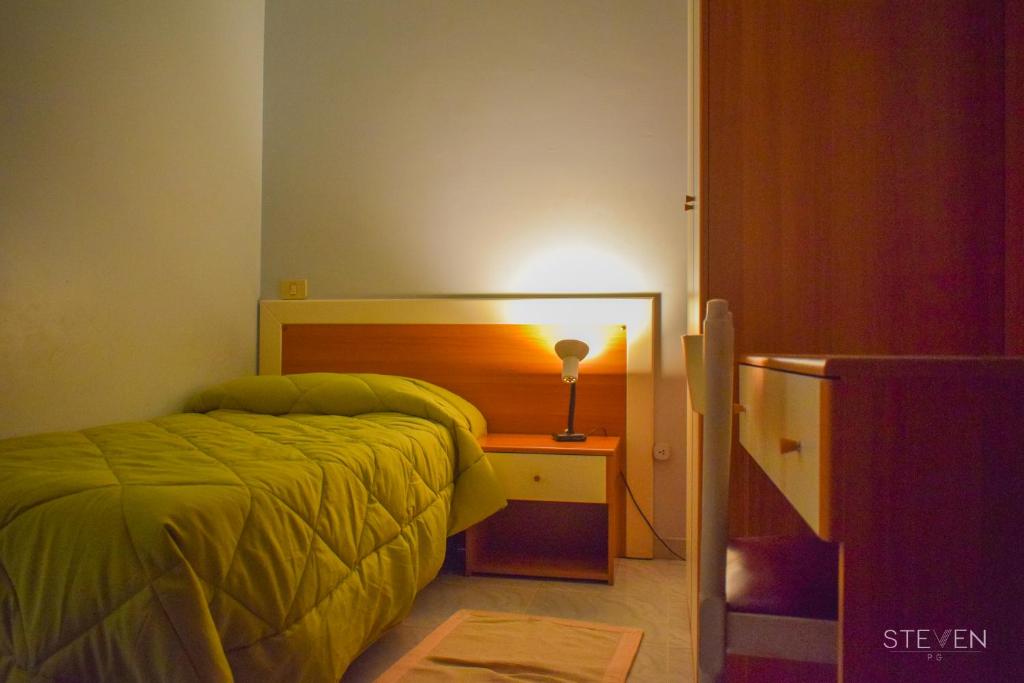 Postel nebo postele na pokoji v ubytování Hotel Ristorante Mommo
