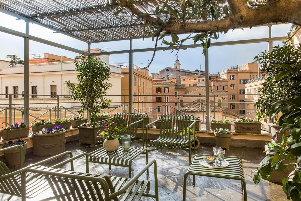 A balcony or terrace at Condominio Monti Boutique Hotel