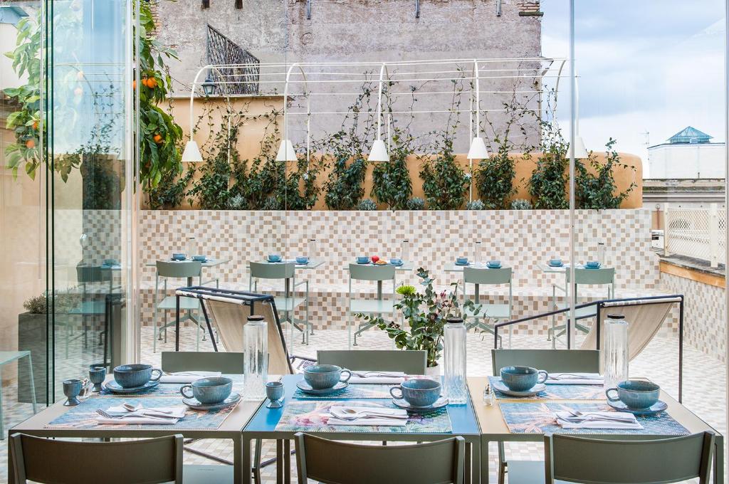A restaurant or other place to eat at Condominio Monti Boutique Hotel