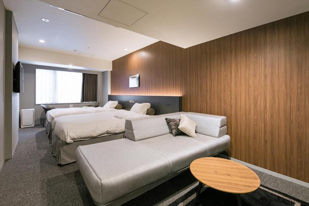 Posezení v ubytování Ginza Capital Hotel Moegi