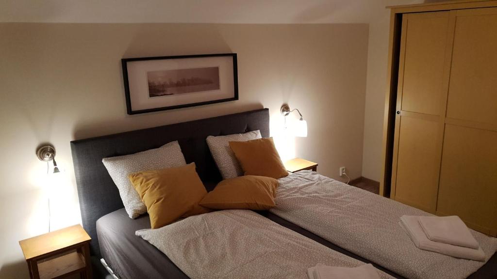 A bed or beds in a room at Stará Lesná ADEX