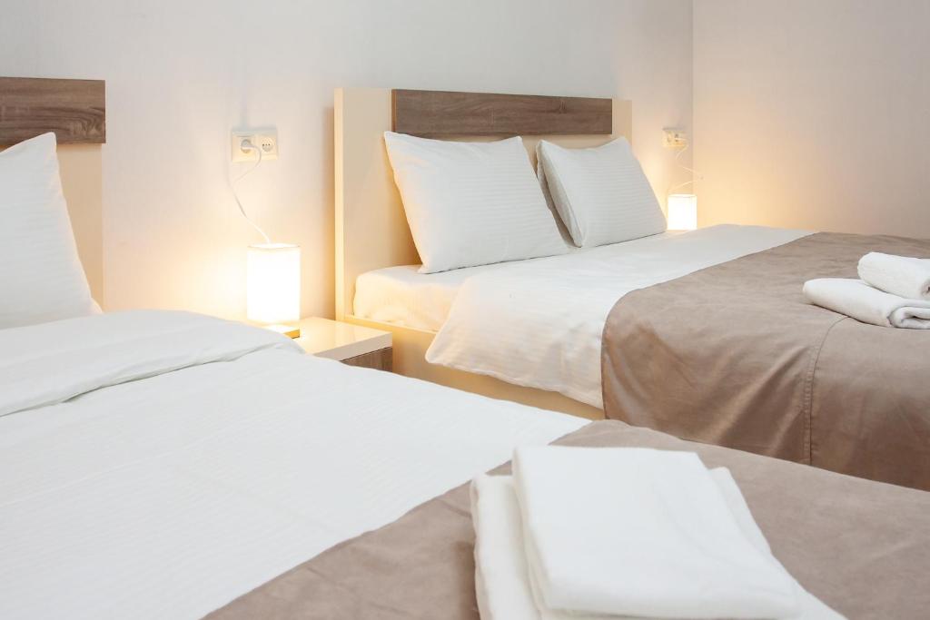 Postel nebo postele na pokoji v ubytování Hotel Casa calda