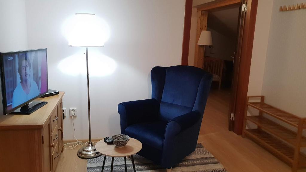 A television and/or entertainment centre at Stará Lesná ADEX