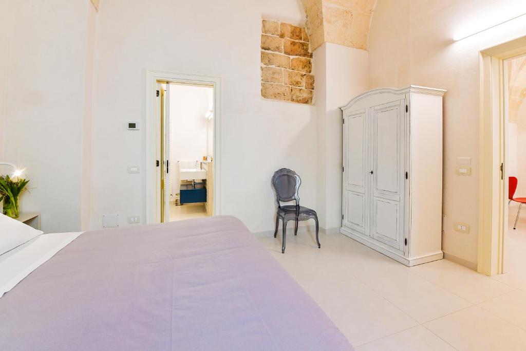 Postel nebo postele na pokoji v ubytování Casa Magadè B&B