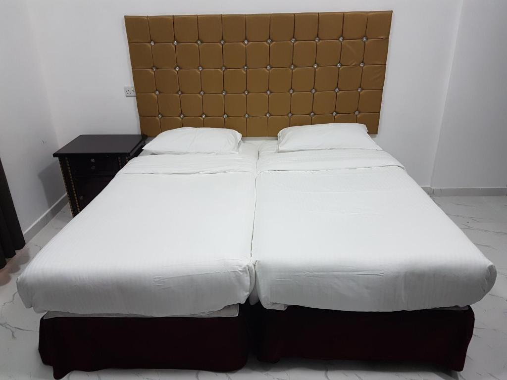 Voodi või voodid majutusasutuse Sea Hotel Apartment toas