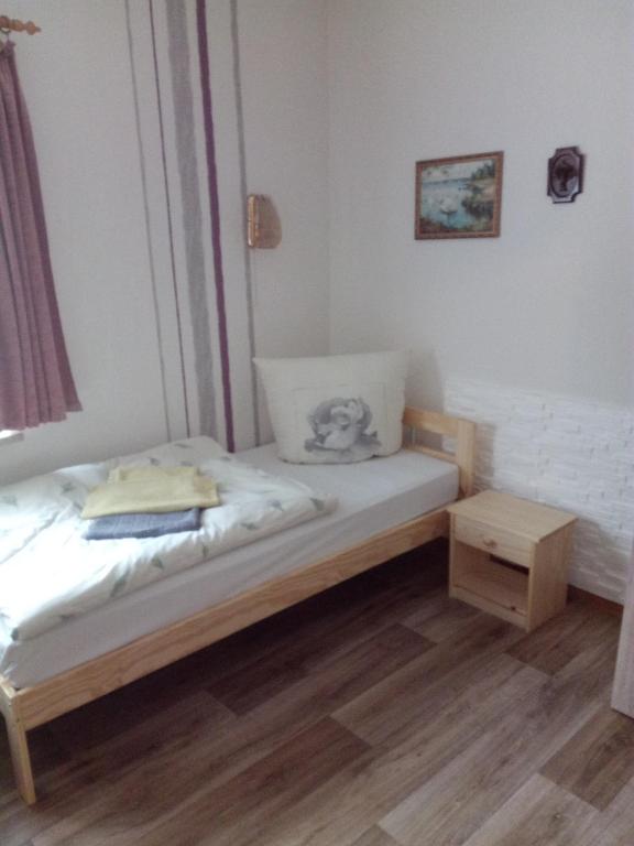 Postel nebo postele na pokoji v ubytování Am Mühlteich