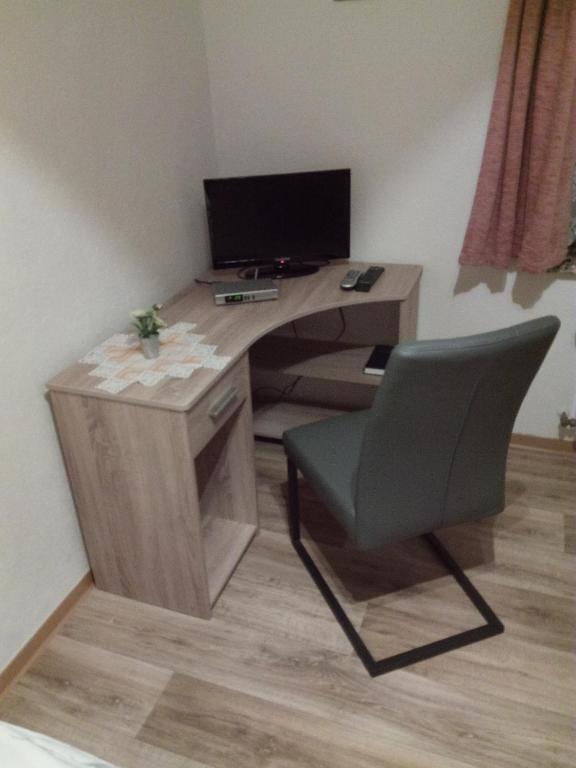TV a/nebo společenská místnost v ubytování Am Mühlteich