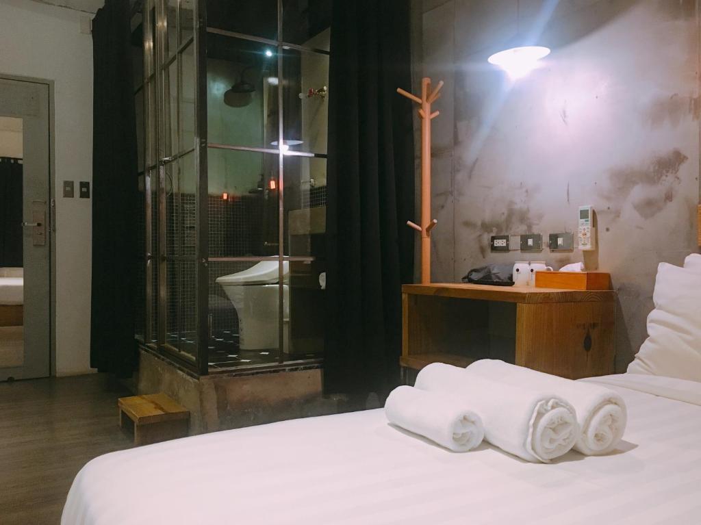 Postel nebo postele na pokoji v ubytování Just Inn 正旅館 台北車站