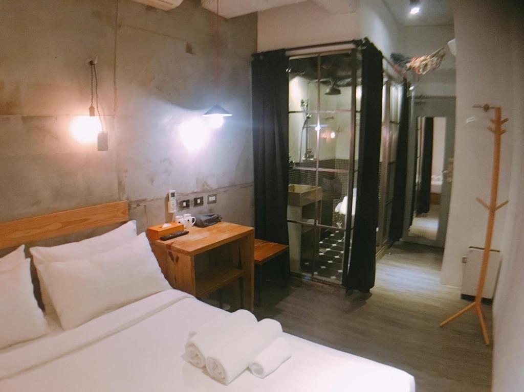 Postel nebo postele na pokoji v ubytování Just Inn 正旅館 台北車站