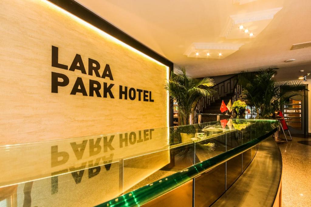 a mall with a laaza park hotel sign on a wall at Lara Park Hotel in Antalya