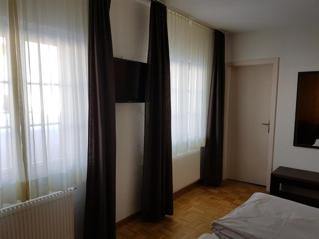 Postel nebo postele na pokoji v ubytování Auberge de la Couronne