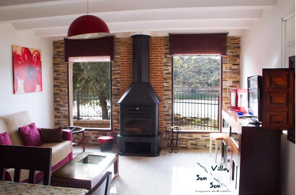 A seating area at Casas Rurales Villa Sem Sem