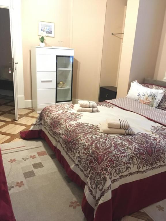 Postel nebo postele na pokoji v ubytování Casa Iulia