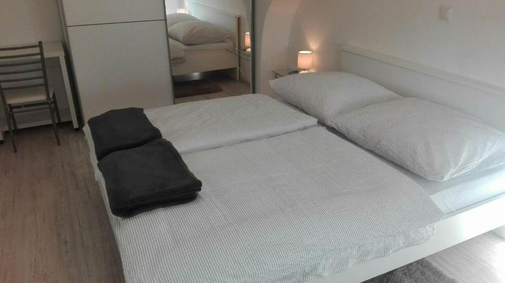 Posteľ alebo postele v izbe v ubytovaní Apartment Osk