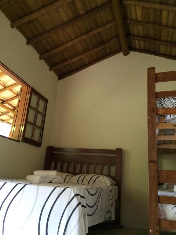Postel nebo postele na pokoji v ubytování Canto do Riacho Suites