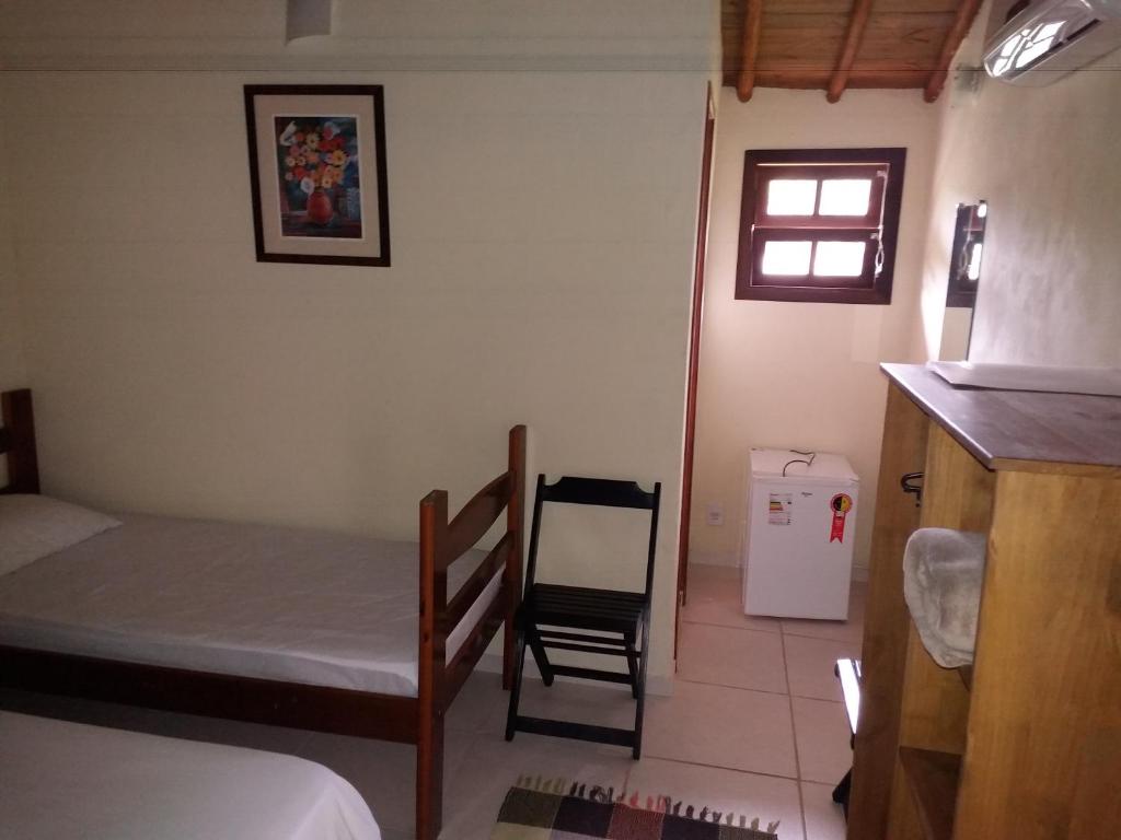Postel nebo postele na pokoji v ubytování Canto do Riacho Suites
