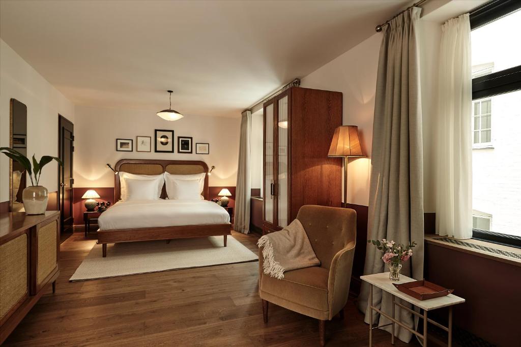 Postel nebo postele na pokoji v ubytování Hotel Sanders