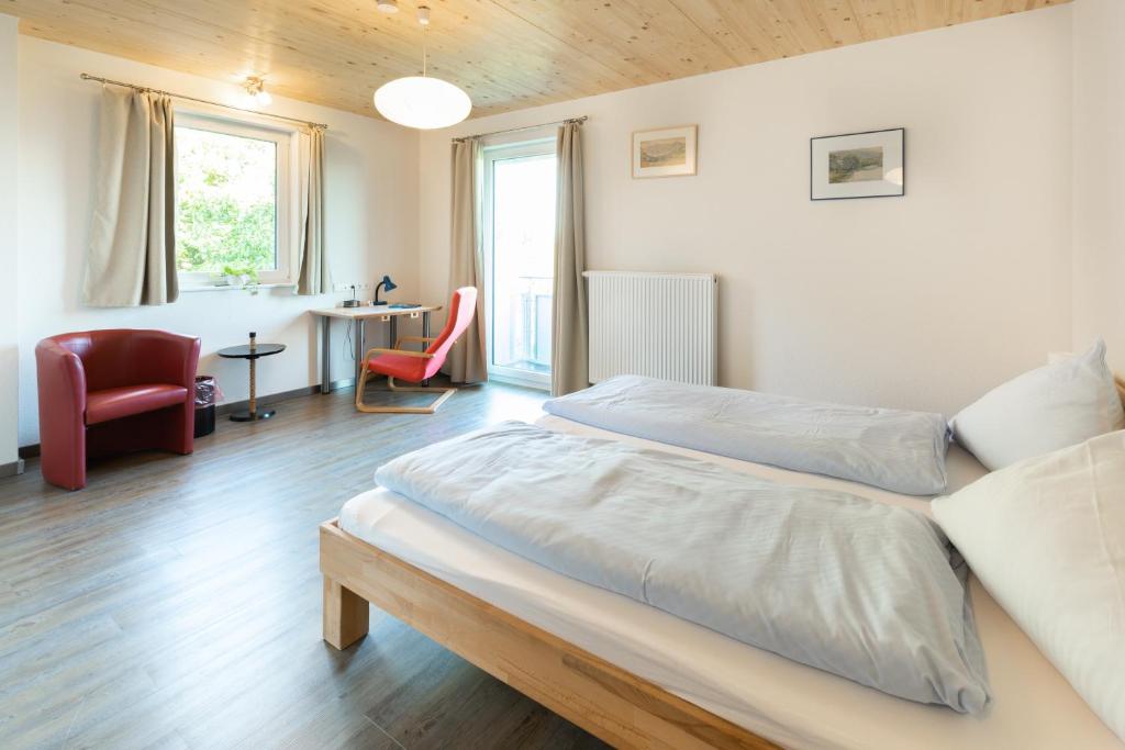Postel nebo postele na pokoji v ubytování Hotel Hohe Flum