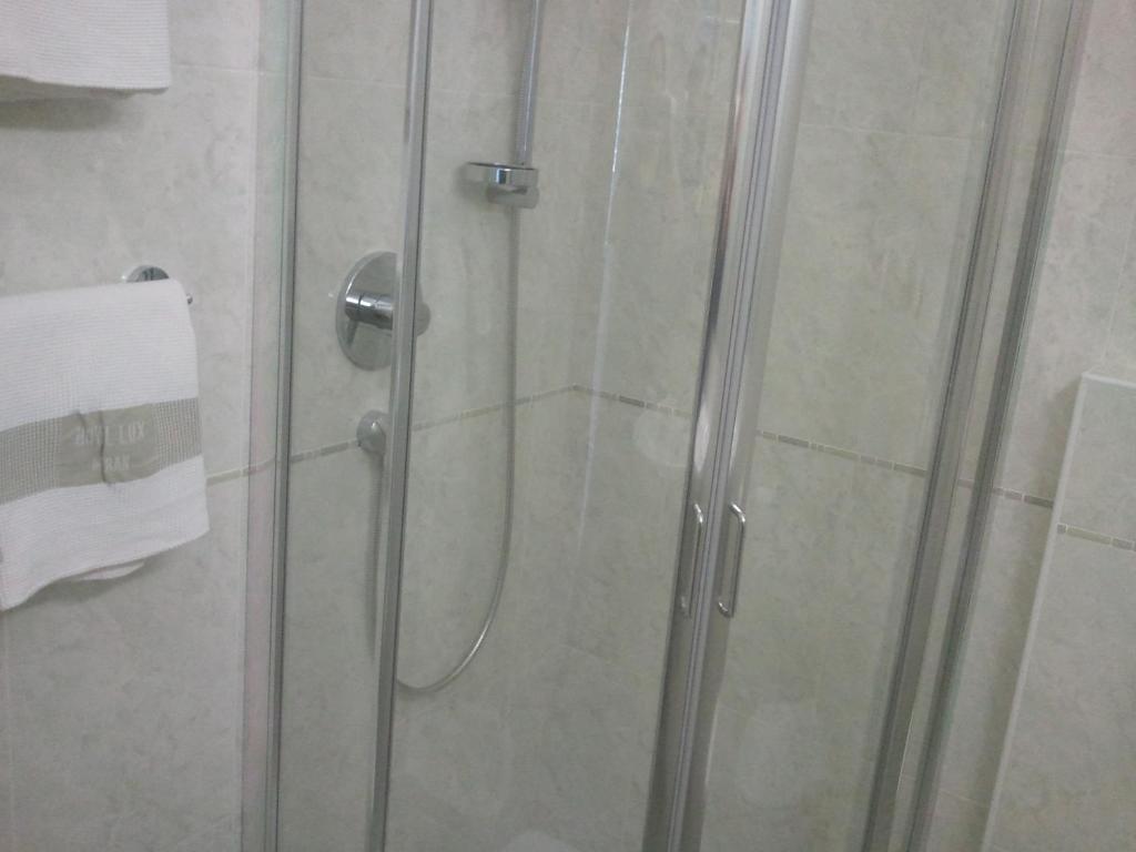 Koupelna v ubytování Hotel Lux