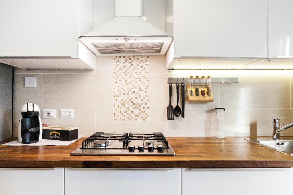 A kitchen or kitchenette at New Capolinea 5 - Apartment