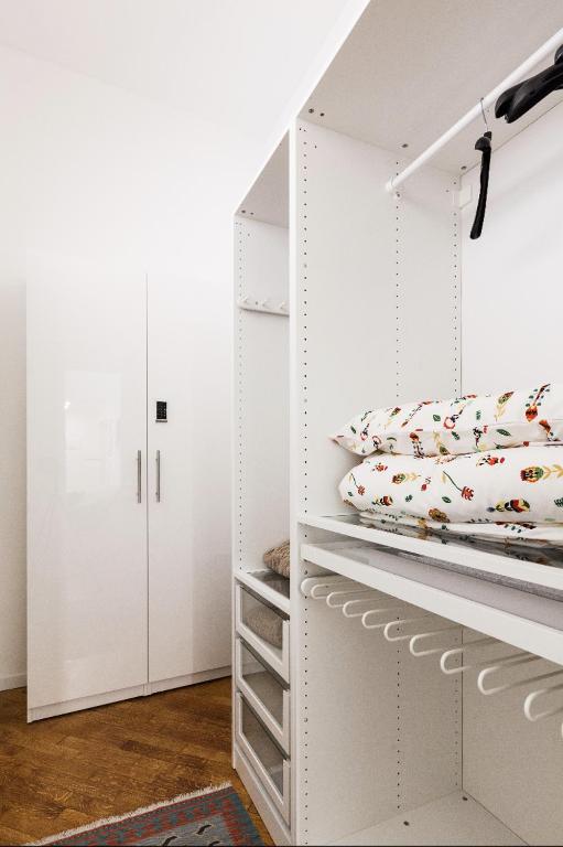 A bed or beds in a room at New Capolinea 5 - Apartment