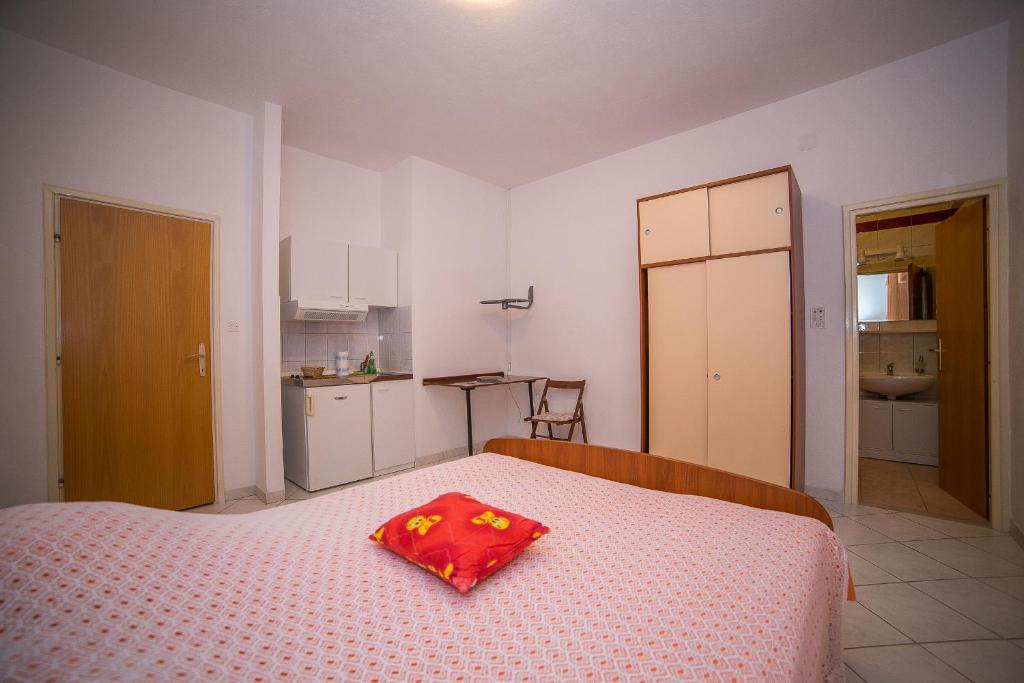 Kuchyň nebo kuchyňský kout v ubytování Apartmani Ina