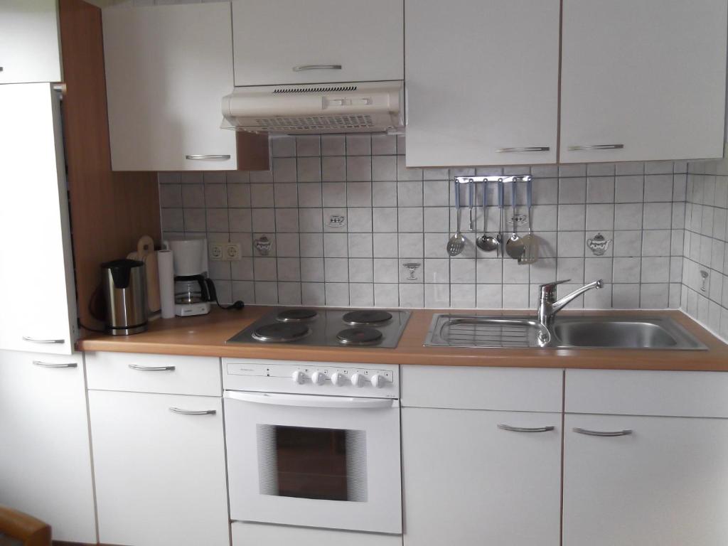 Kuchyň nebo kuchyňský kout v ubytování Hotel - Garni Stabauer