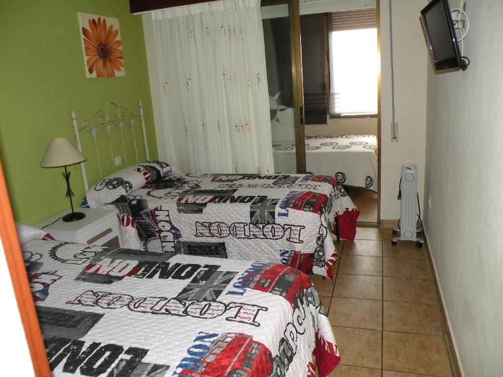 Postel nebo postele na pokoji v ubytování GEMELOS 12 II - FINCAS ARENA