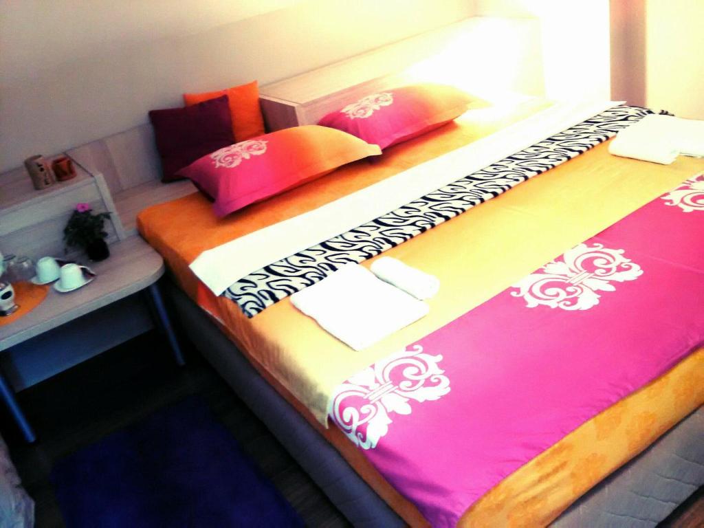 Postel nebo postele na pokoji v ubytování Hotel Bulevar