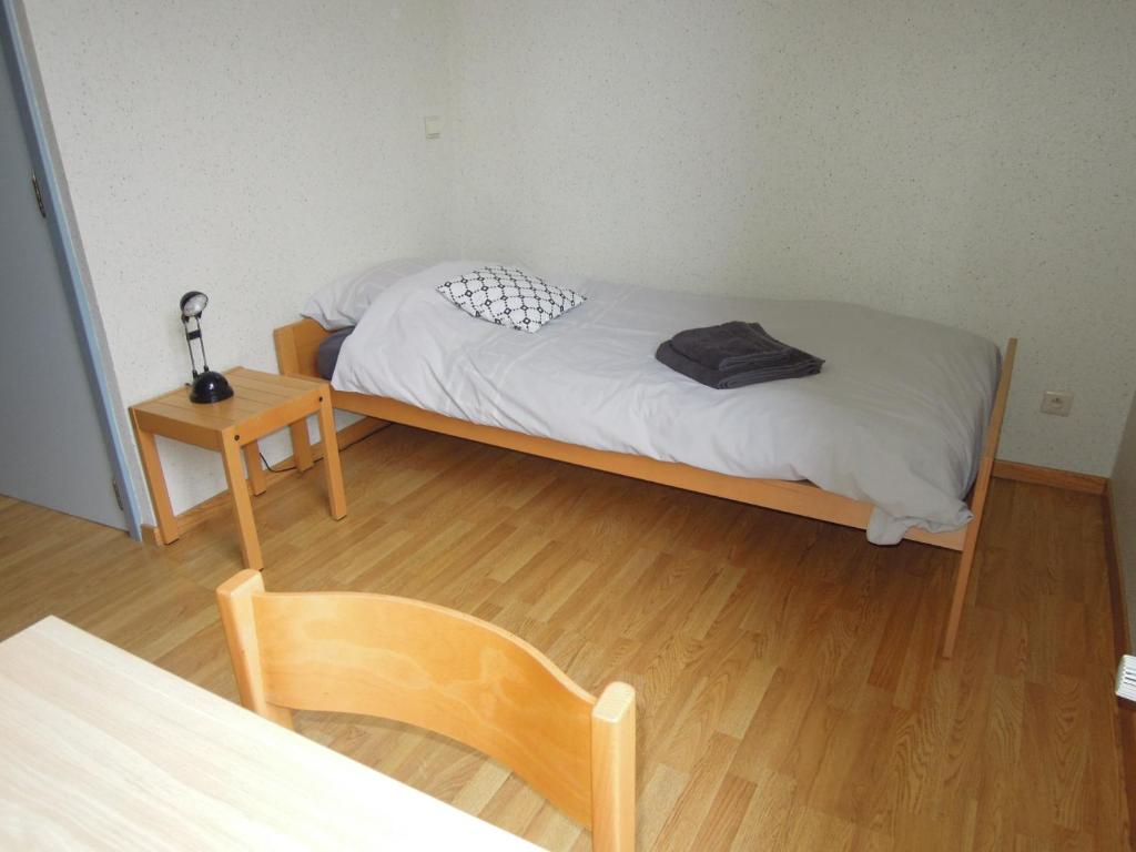 Postel nebo postele na pokoji v ubytování KLOOSTERSTRAAT40
