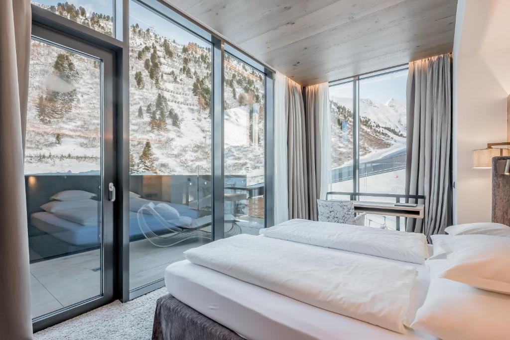 Postel nebo postele na pokoji v ubytování Hotel Gotthard-Zeit