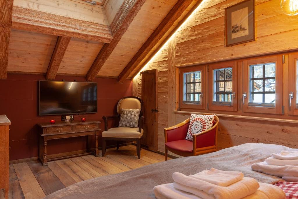 Televiisor ja/või meelelahutuskeskus majutusasutuses Chalet Schuler
