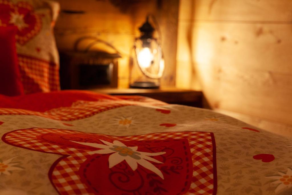 Voodi või voodid majutusasutuse Chalet Schuler toas