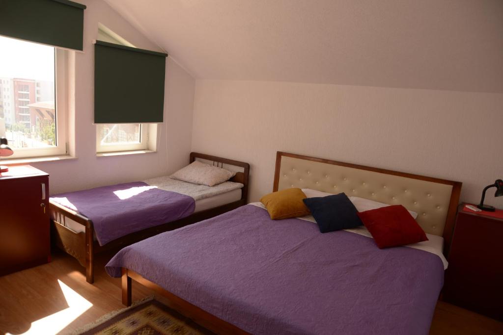 Postel nebo postele na pokoji v ubytování Hostel Tuba