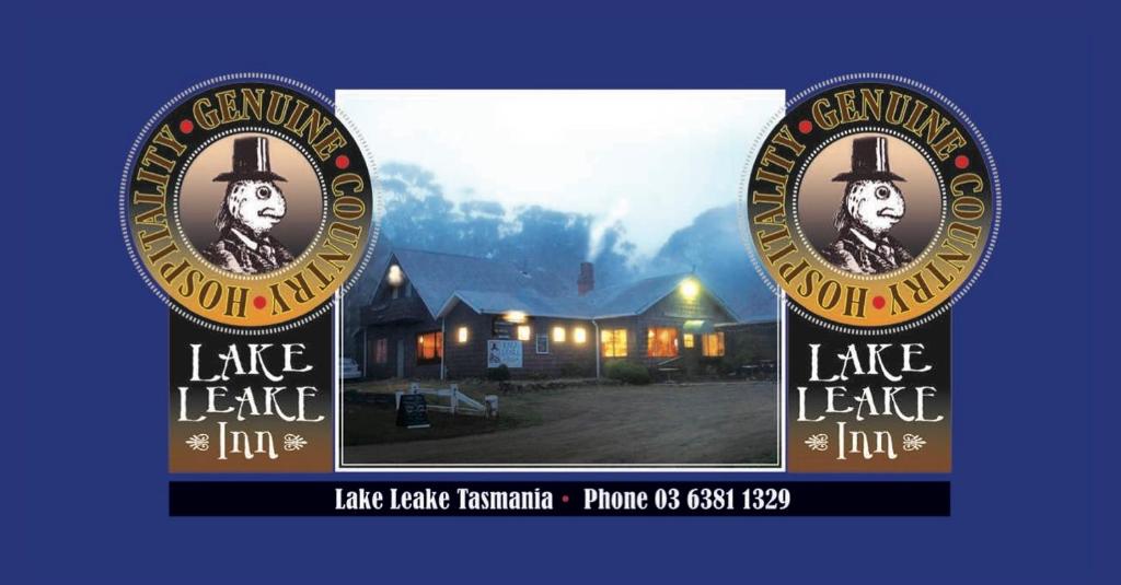 two signs for a lake house with a horse on them at Lake Leake Inn in Lake Leake