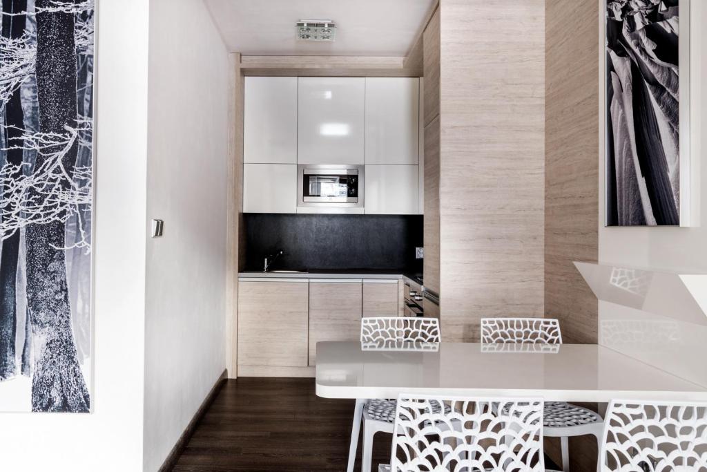 Kuchyň nebo kuchyňský kout v ubytování HOTEL PECR WELL