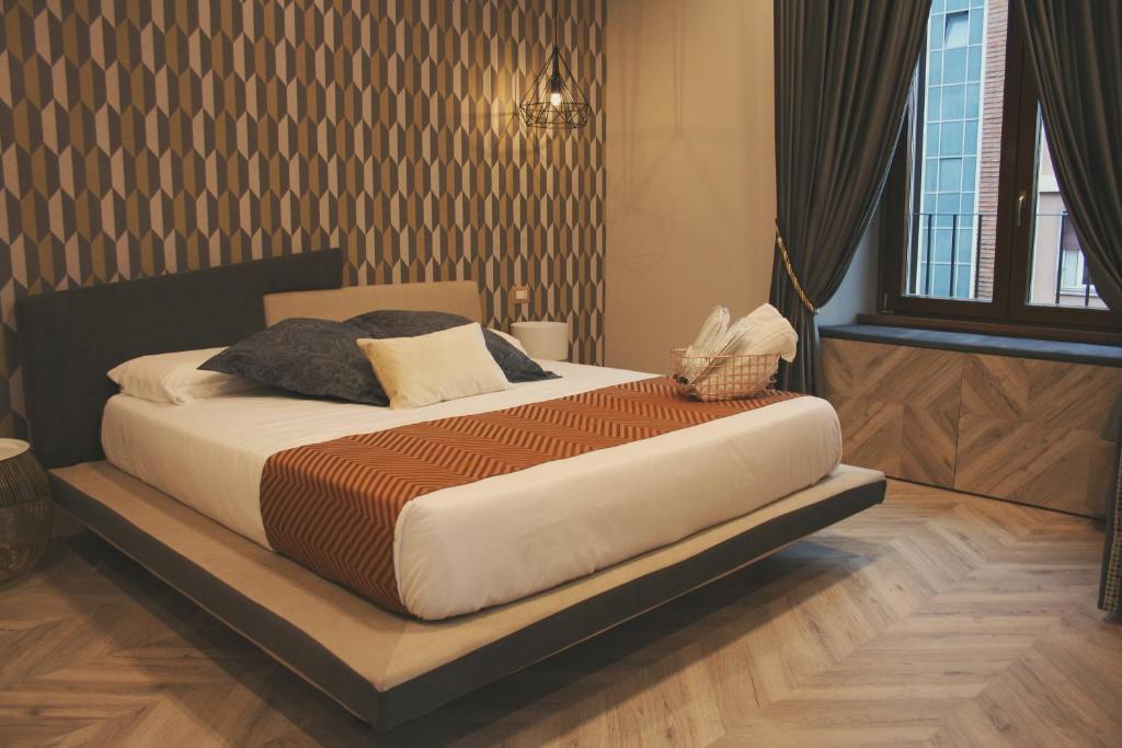 Postel nebo postele na pokoji v ubytování Hotel Roma Vaticano