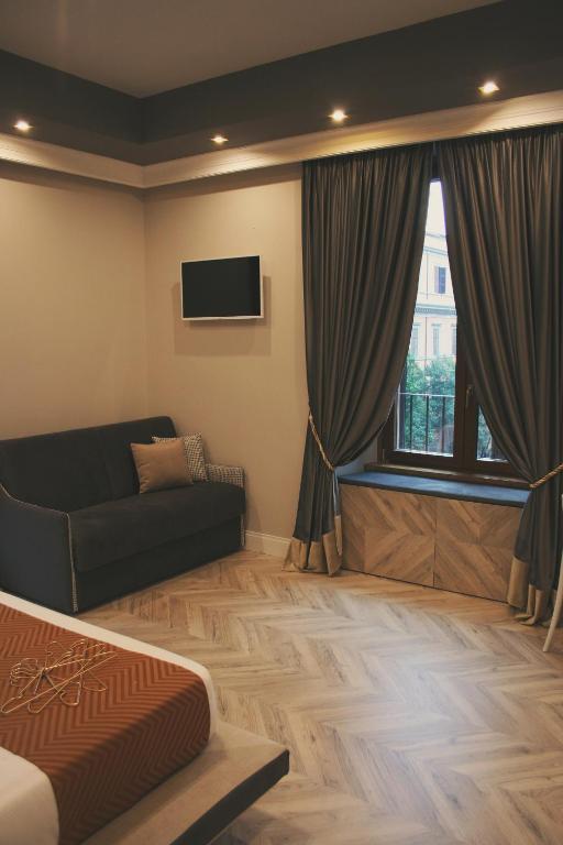 TV a/nebo společenská místnost v ubytování Hotel Roma Vaticano