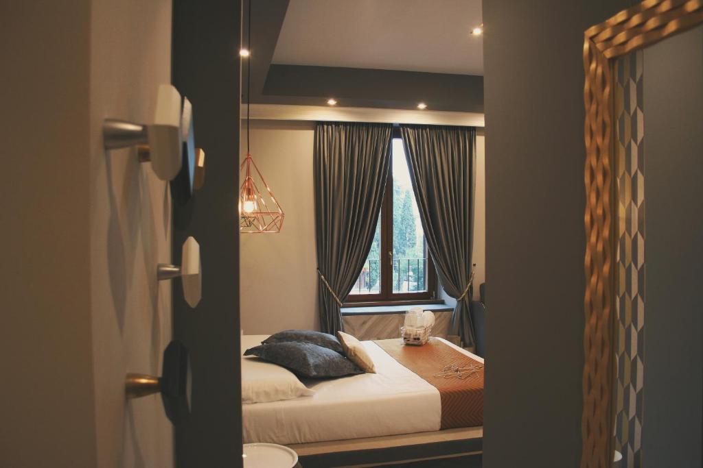 Postel nebo postele na pokoji v ubytování Hotel Roma Vaticano