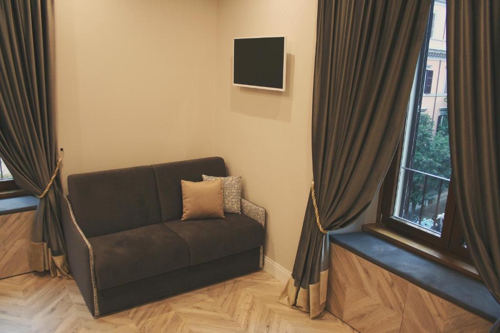 TV a/nebo společenská místnost v ubytování Hotel Roma Vaticano