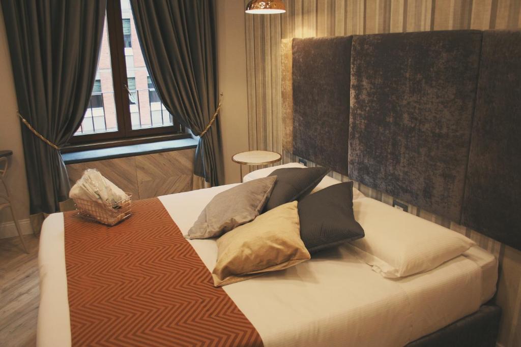 Postel nebo postele na pokoji v ubytování Hotel Roma Vaticano