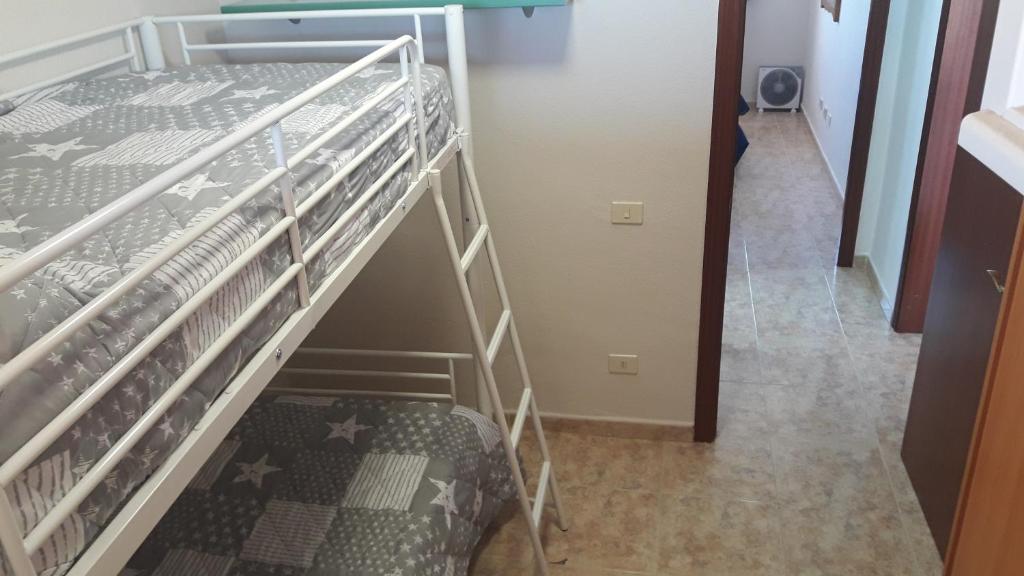 Posteľ alebo postele v izbe v ubytovaní Burrero Seasight