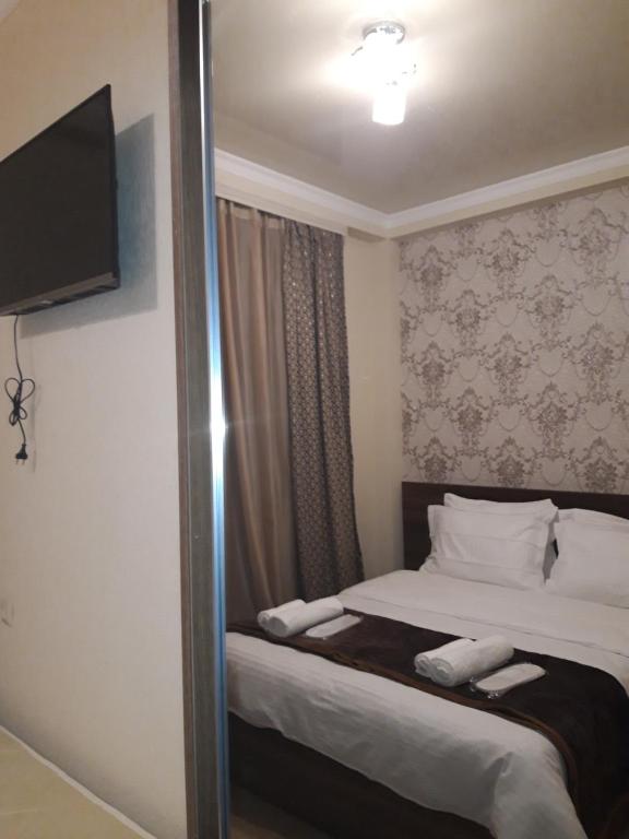 Postel nebo postele na pokoji v ubytování Hotel IVERIA