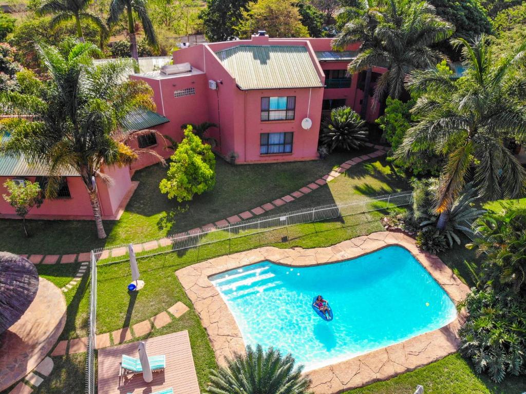 an aerial view of a house with a swimming pool at River Bird Guest House in Lusaka