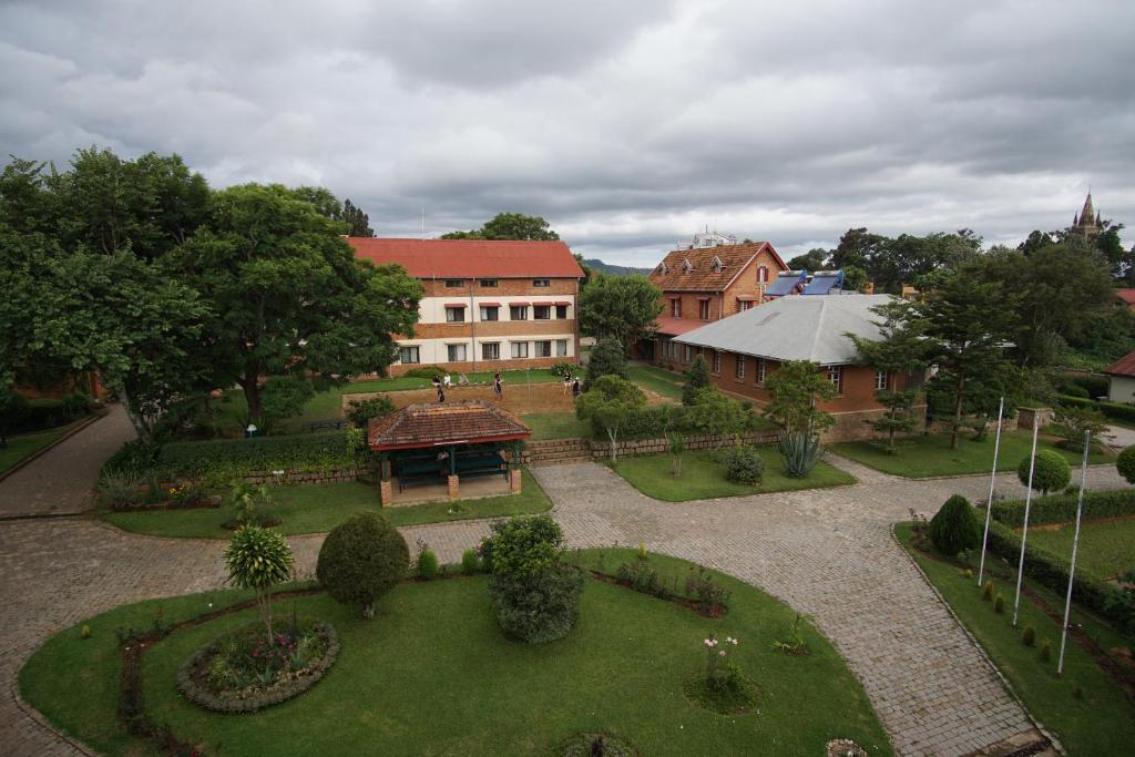 an aerial view of a building with a garden at Lovasoa 4C in Antsirabe