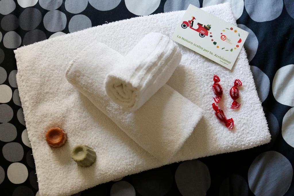 a close up of a white towel with red lipstick at I Cavalieri di Malta in Palermo