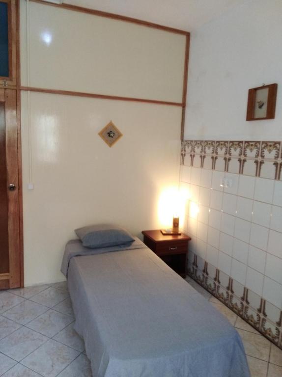 Postel nebo postele na pokoji v ubytování Edificio Magico